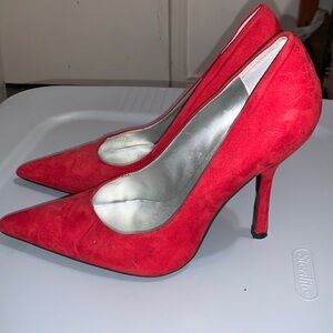 Guess red high heel stiletto pump.